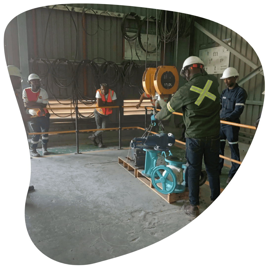 Learners in high-visibility gear during on-site training